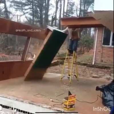 Touching a slab of wood which isn't supported by bolts