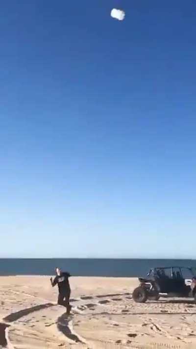 Just some guys having fireworks fun at the beach...