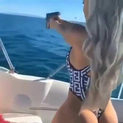 Boat, bikini, gun &amp;amp; butt.