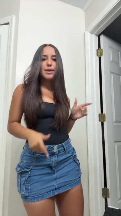 Absolutely love her in that jean skirt 🤤
