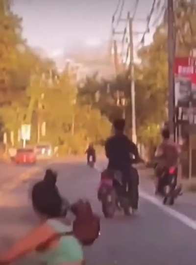 Trying to kick another rider.