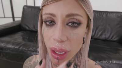 She says "Black sperm, hot" but her facial expression says something else