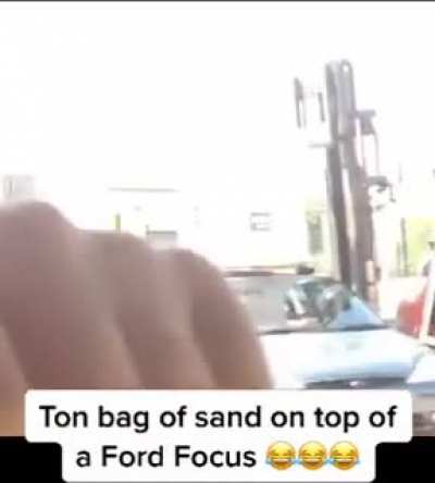 loading a tonne of sand on a family car