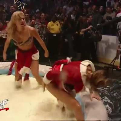 Torrie Wilson Spanks Stacy Keibler For Christmas And Submits Her