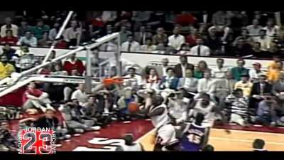 Michael Jordan changes to a layup realizing he can't make the dunk