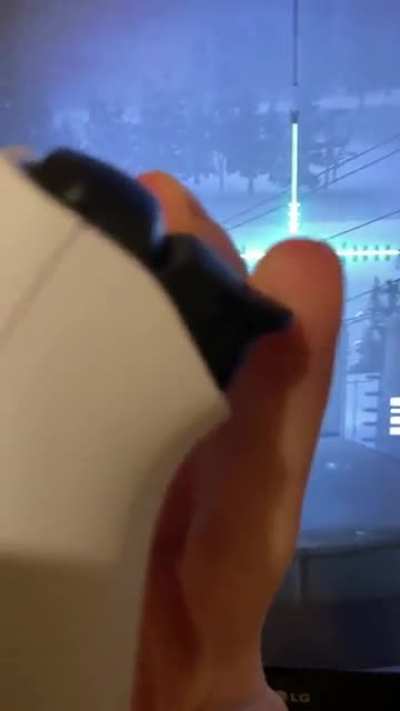 The PS5&rsquo;s adaptive trigger on the sniper mission