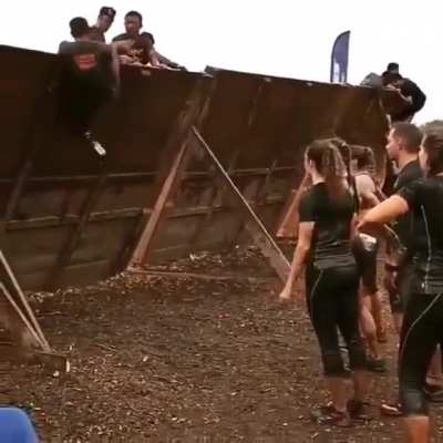 Man climbs over &lsquo;hard to climb&rsquo; wall using only one arm