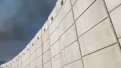 Military using trebuchet against the enemy