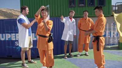 Shaolin Monk throwing a Needle Through Glass in Super Slow Motion