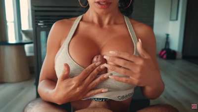 Between her big tits