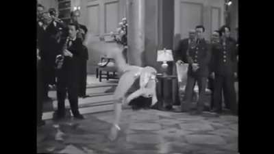 Miriam LaVelle flipping in heels, 1944.