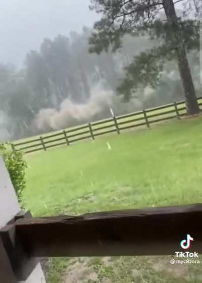 This woman was able to film lightning and keep recording.