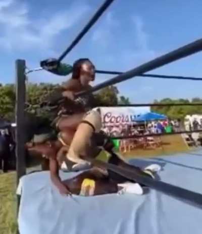 Queen Aminata uses her opponent&rsquo;s face as a towel on a hot summer day.