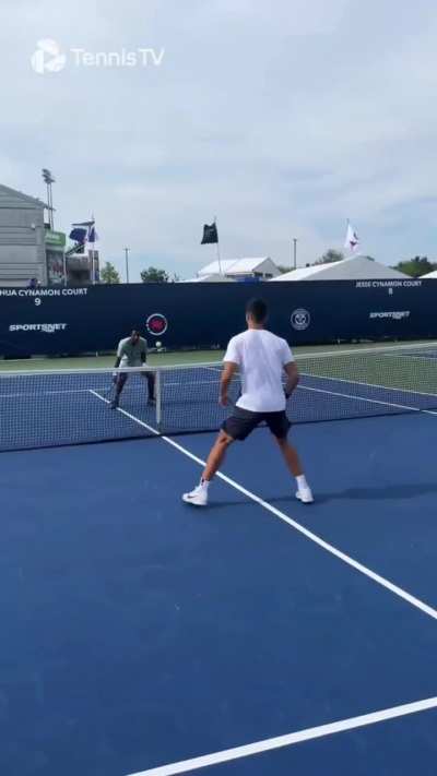 Alcaraz and Monfils having fun. And...Carlitos lost, so he had to do some push-ups.