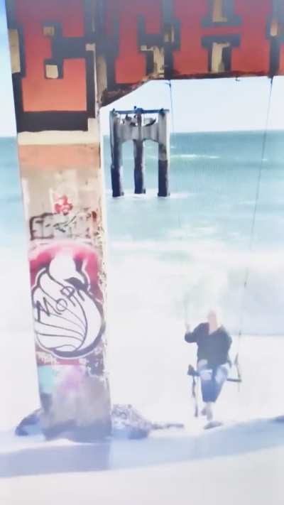 Swinging by the sea, dummy!