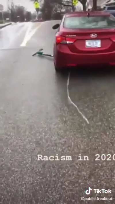 Crazy dude runs over the scooter!