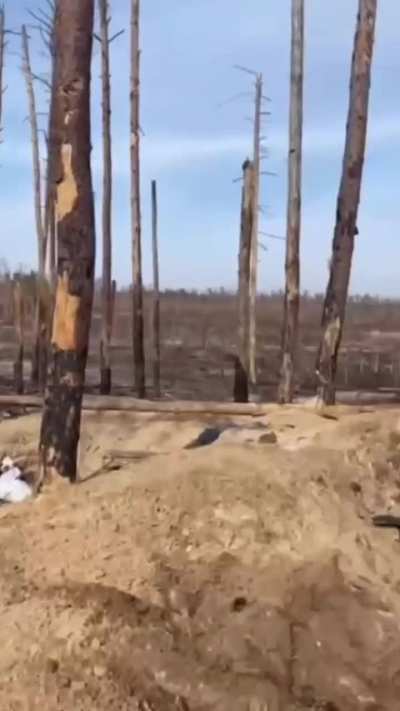 Ukrainian soldiers fire RPG/AT4 at russian positions.
