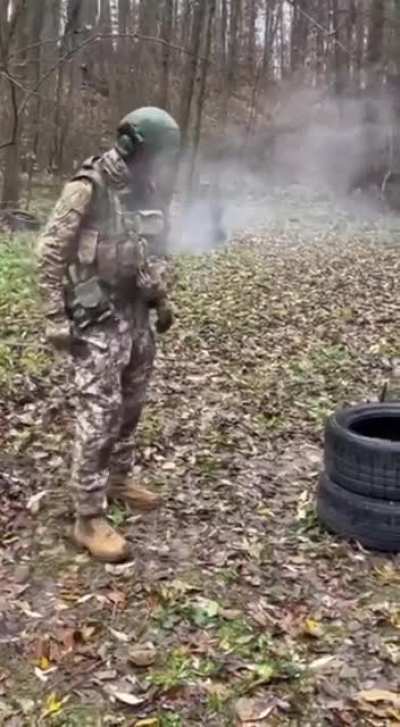 Ukrainian soldier let&rsquo;s his buddy shoot him in order to show the strength of their body armor