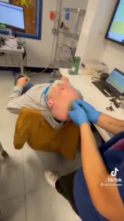Sticking a suction cup on their coworkers head