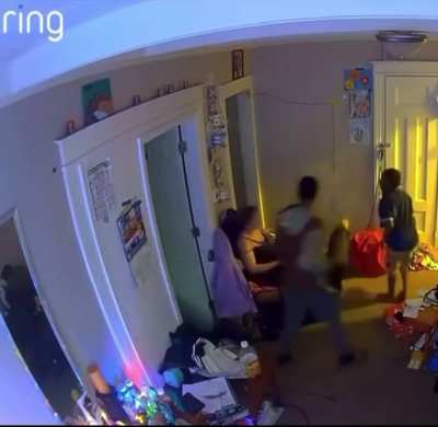 Random woman enters home in broad daylight, gets escorted gently out.