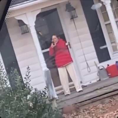 Woman points gun at Amazon delivery driver