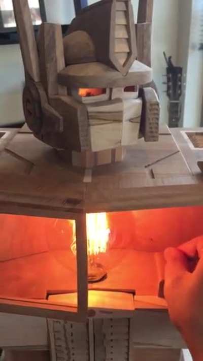 This 5ft tall wooden Optimus Prime lamp statue.