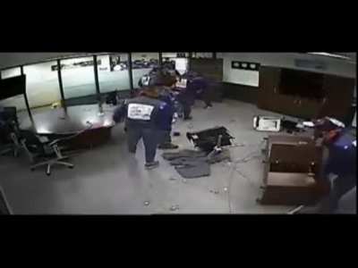 GM workers in South Korea thrashing the CEO's office after promised bonuses were withheld.