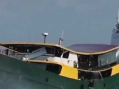 Bridge crew of the Philippine resupply boat "Unaize Mae 4", signals both the China Coast Guard and the Philippine Coast Guard that it's in distress, as the CCG disabled and severely damage her as she tried to run the blockade.