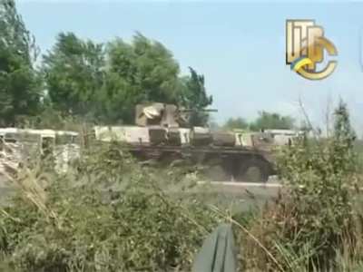 Ukrainian BTR-4 assists soldiers manning a checkpoint near Sloviansk in fending of a "Separatist" probing attack - 2014
