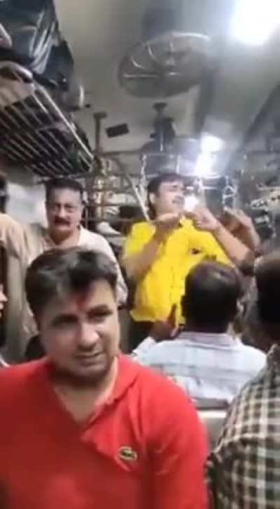 Some guys in a Mumbai train
