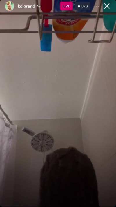 Thick female in the shower on IG Live w/ a nip slip