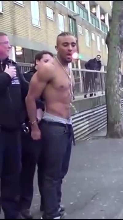 Guy pisses himself after getting arrested