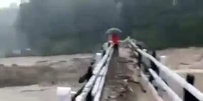 Crossing a flooded bridge