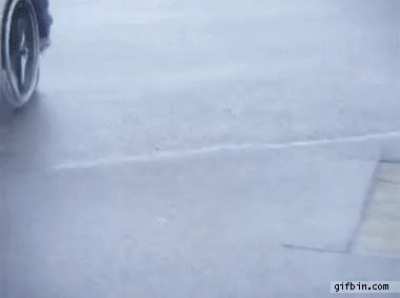 Going full speed on a wheelchair down the hill
