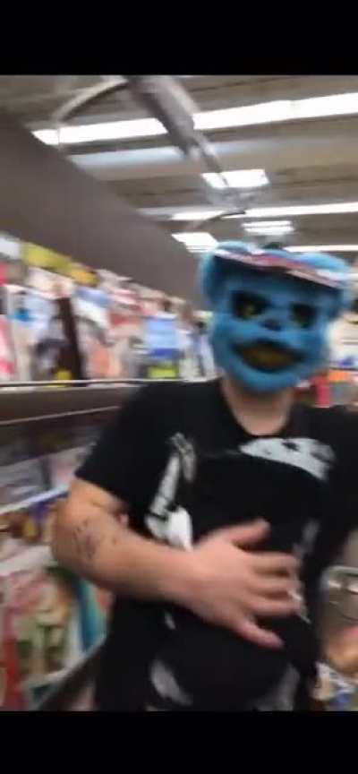 Dad scares son with mask