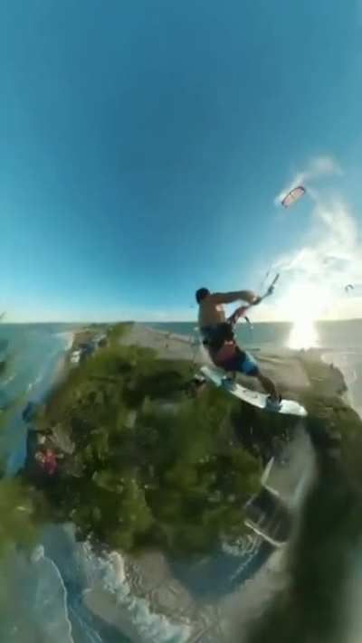 Kiteboarding jump over an island
