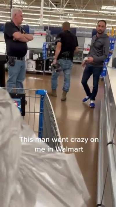 Dude flys off the handle on a woman in Walmart.